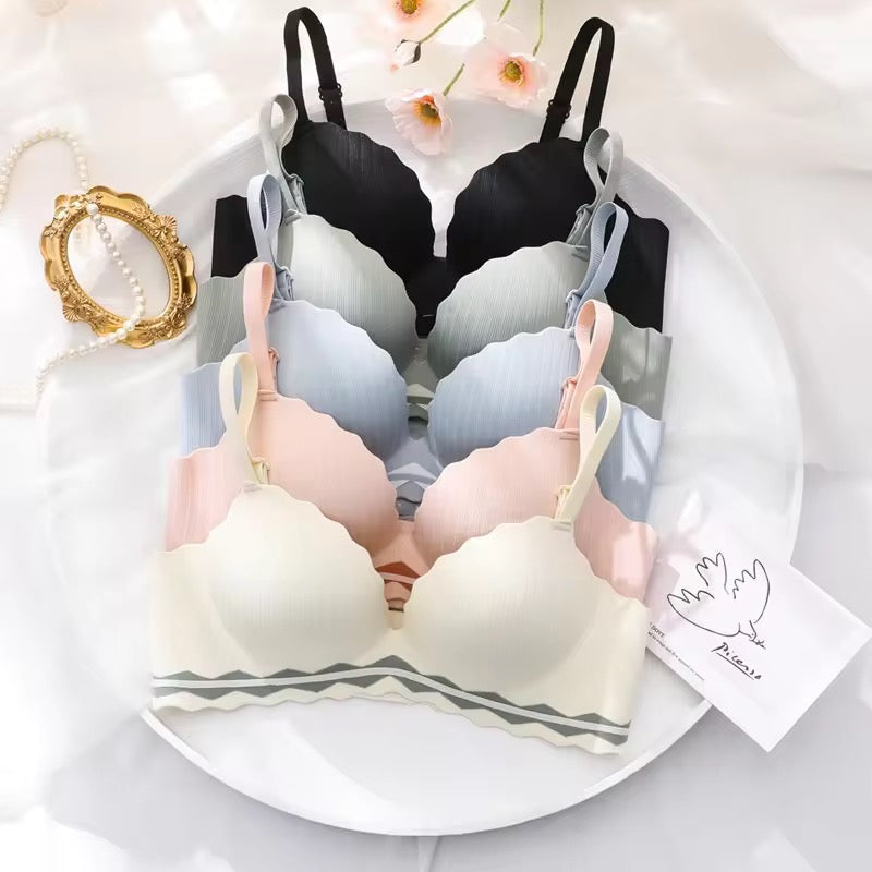 A set of seamless push-up bras is displayed 